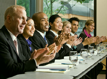 Image: Group applauding after a presentation